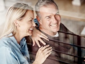 happy mature couple smiling after ed treatment