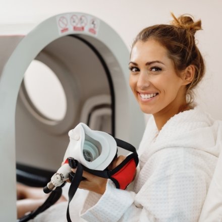 Lady about to enter pressure chamber to improve recovery.